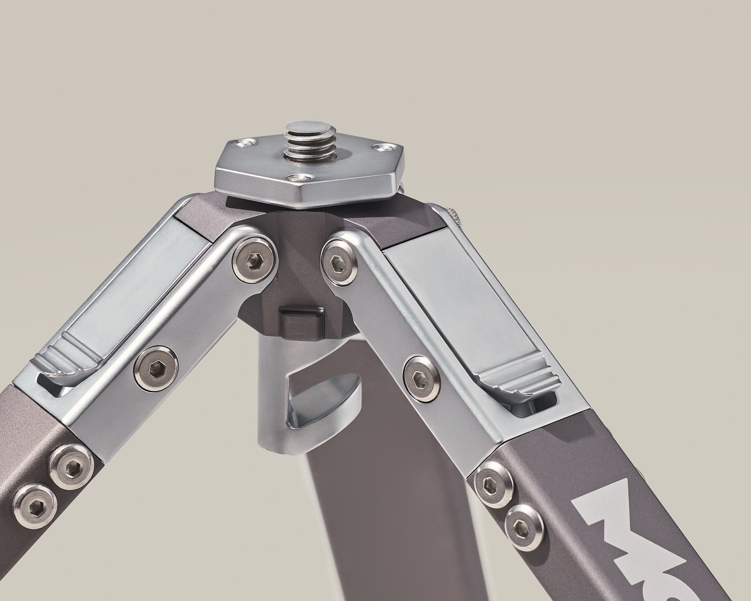 Close photo of Mountain Minmal Tripod's modular center column in the reduced configuration.